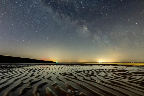Melkweg sporen in het zand