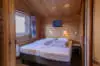 Slaapkamer Finse bungalow Infrarood Sauna de Riesen Terschelling