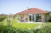 Terras grasveld Villabungalow openhaard Tjermelan Terschelling