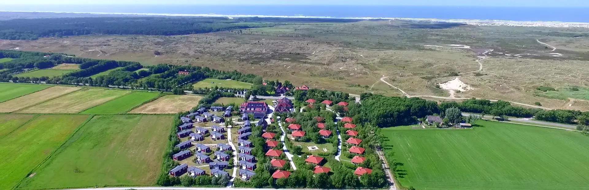 Luchtfoto Tjermelan zomer duinen noordzee